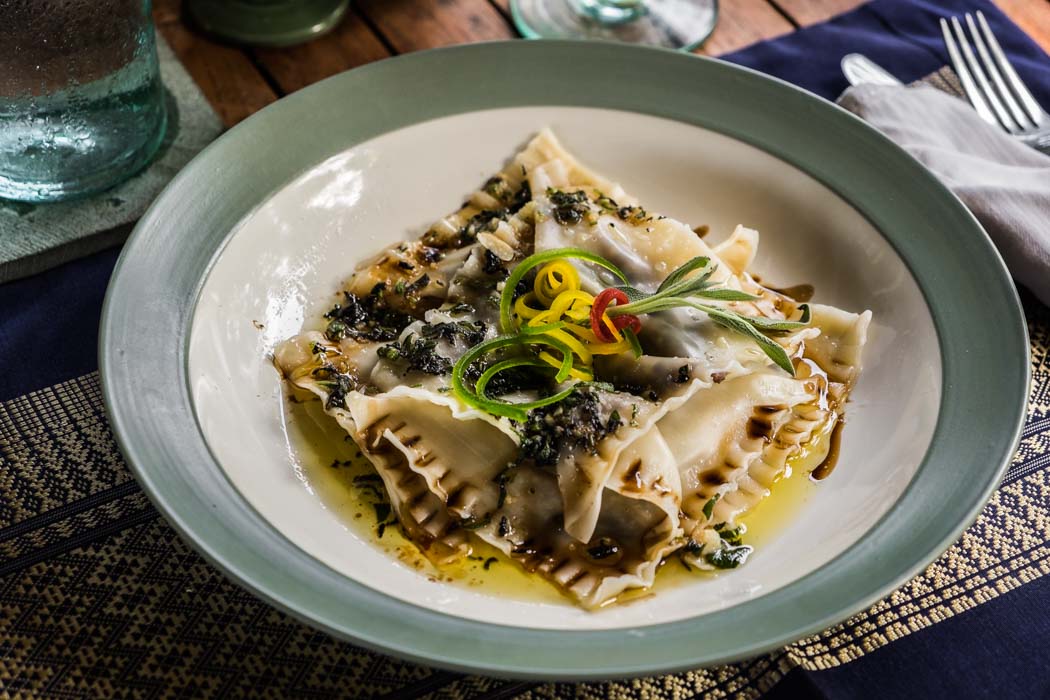 An organic vegetarian pasta in a restaurant of Ubud, Bali.