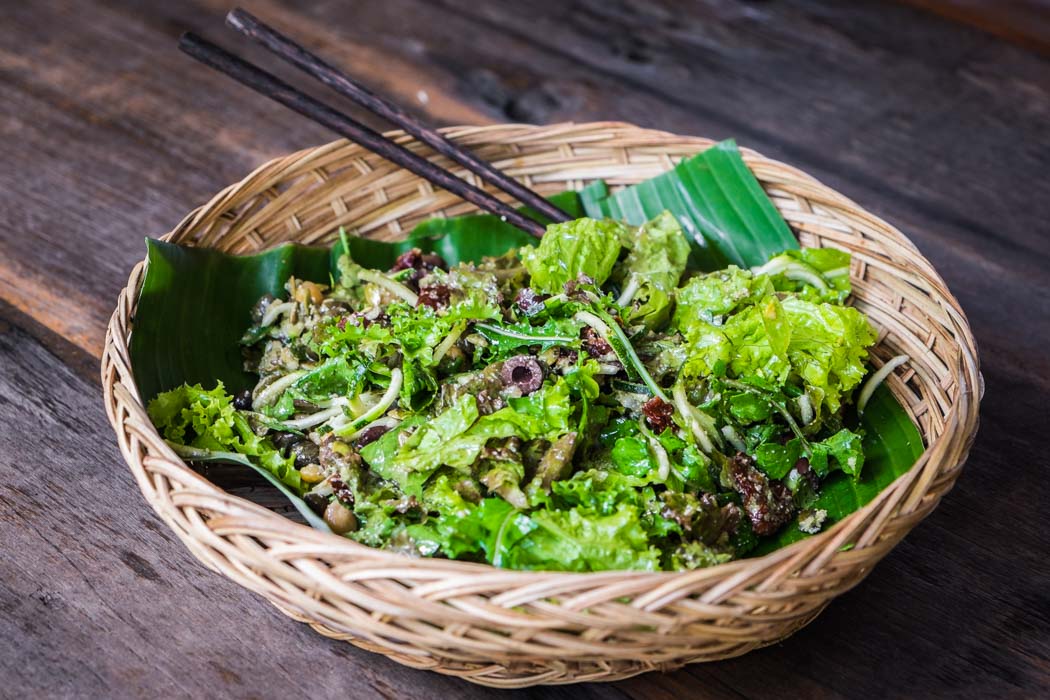 An organic vegetarian raw salad in a restaurant of Ubud, Bali.