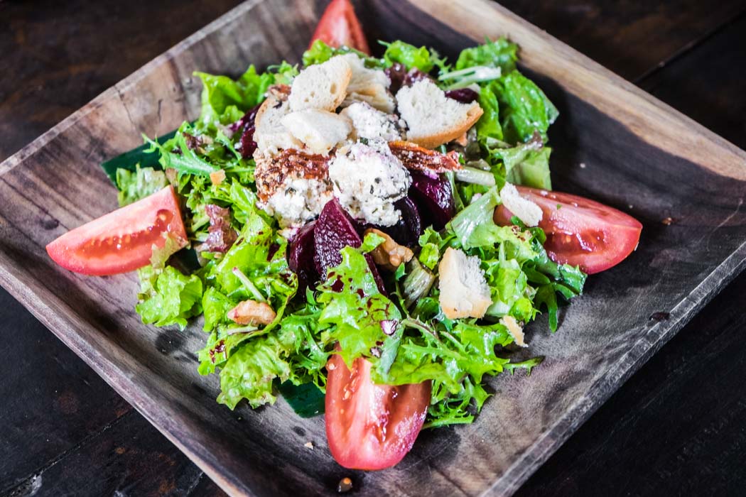 An organic vegetarian raw salad in a restaurant of Ubud, Bali.