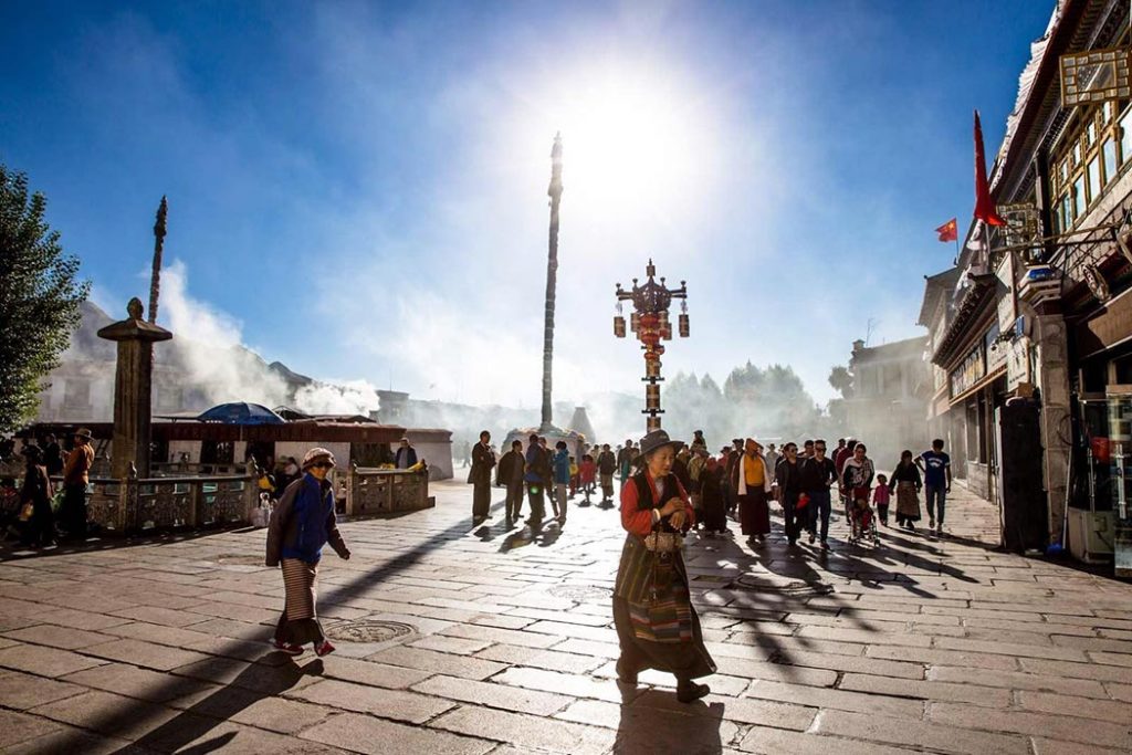 Crowds of devoted Tibetan pilgrims around Jokhang Temple in Lhasa.